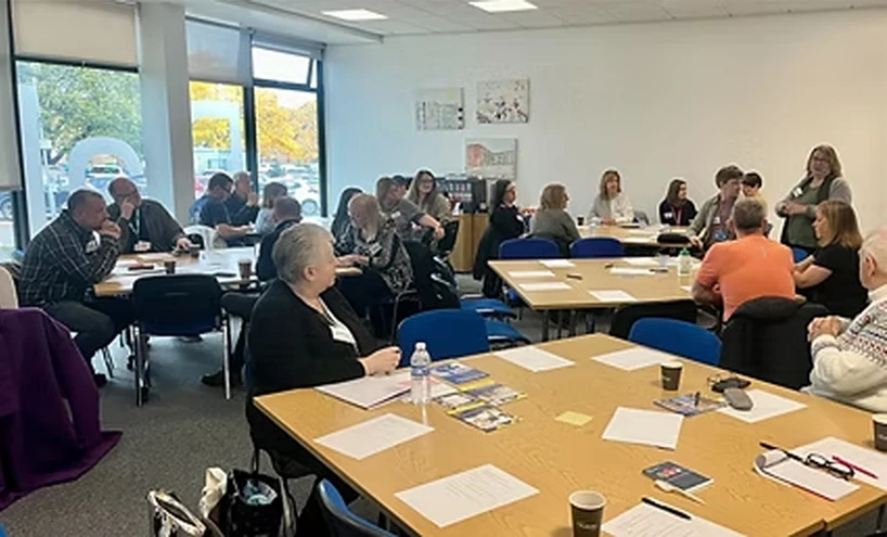 Clare Adamson MSP in discussion with members of the Community Action Network during a roundtable meeting.