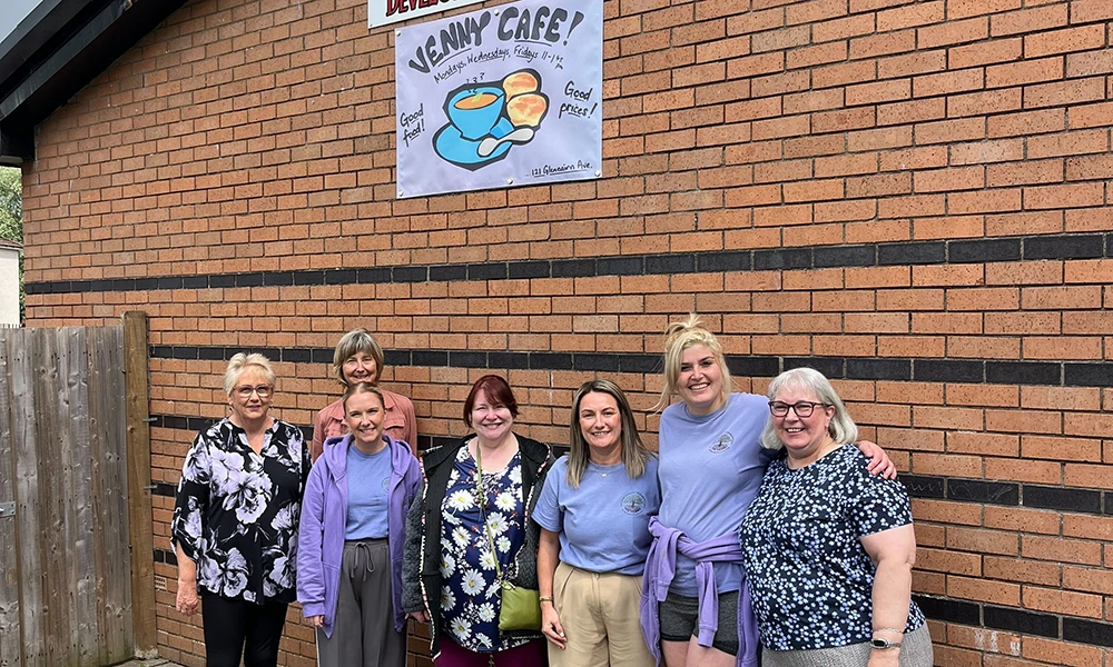 Clare Adamson MSP with community members outside Veanny Café in Motherwell.